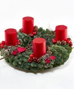 Adventskrans med røde bloklys