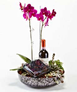 Plantedekoration med vin og lækker chokolade