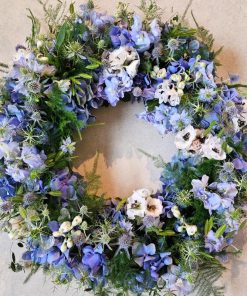 En blå begravelseskrans