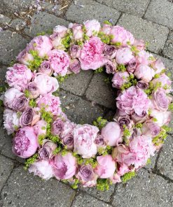 En lyserød begravelseskrans